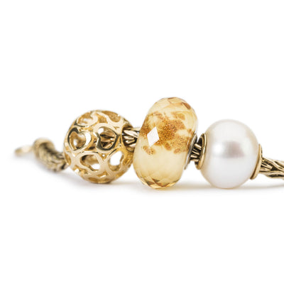 Witte parel met goud